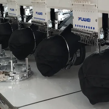Bulk cap production on embroidery machines