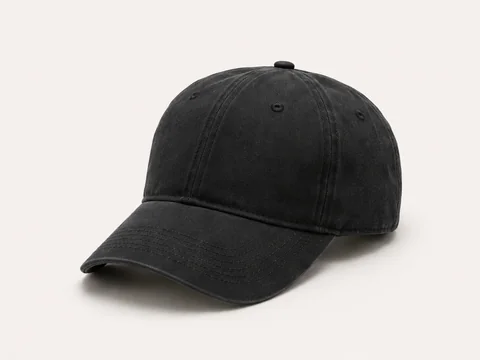 Black low-profile dad hat in washed cotton twill with curved brim