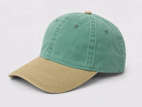 Pigment-dyed washed hat with faded green crown and khaki brim